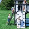 Backyard Discovery Canyon Creek Cedar Wood Swing Set with Wave Slide, Clubhouse, Play Kitchen, Picnic Area, Belt Swings, Web Swing, Rock Wall, Balconies, Playhouse, Step Ladder, Outdoor Playset