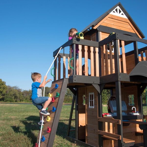 bef5e60a1e6b4934bcd9c218c8188613 Backyard Discovery Canyon Creek Cedar Wood Swing Set with Wave Slide, Clubhouse, Play Kitchen, Picnic Area, Belt Swings, Web Swing, Rock Wall, Balconies, Playhouse, Step Ladder, Outdoor Playset