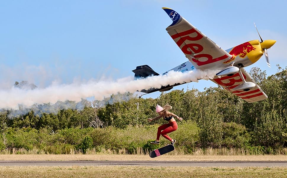 plane flying low over skateboarder